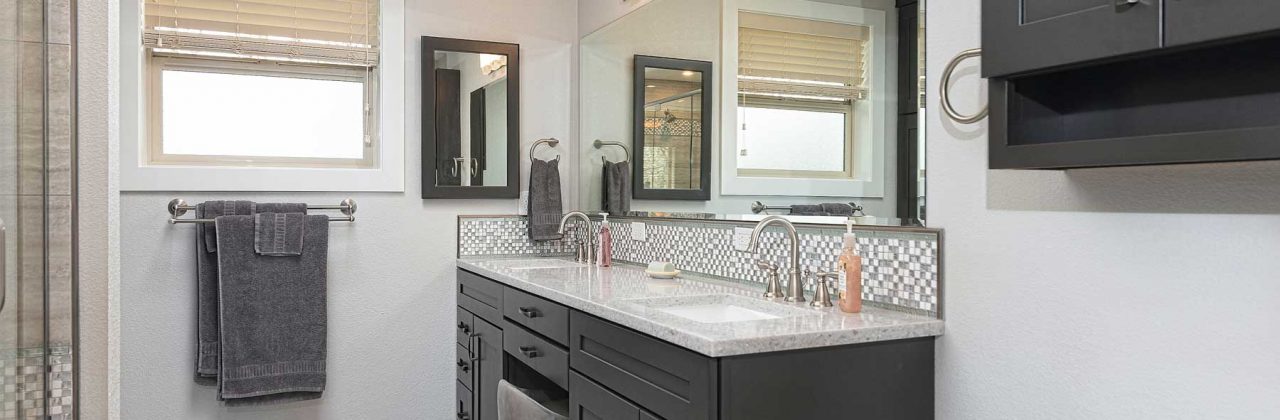 The old master bath was opened up.  The new space includes a much roomier shower plus more storage.  Many clients are nixing their rarely used tubs in favor of large walk-in showers.